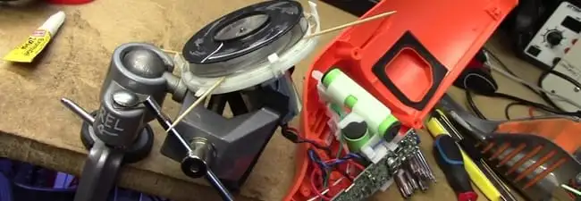 Vacuum cleaner repair parts and tools on a workbench in Allentown, PA